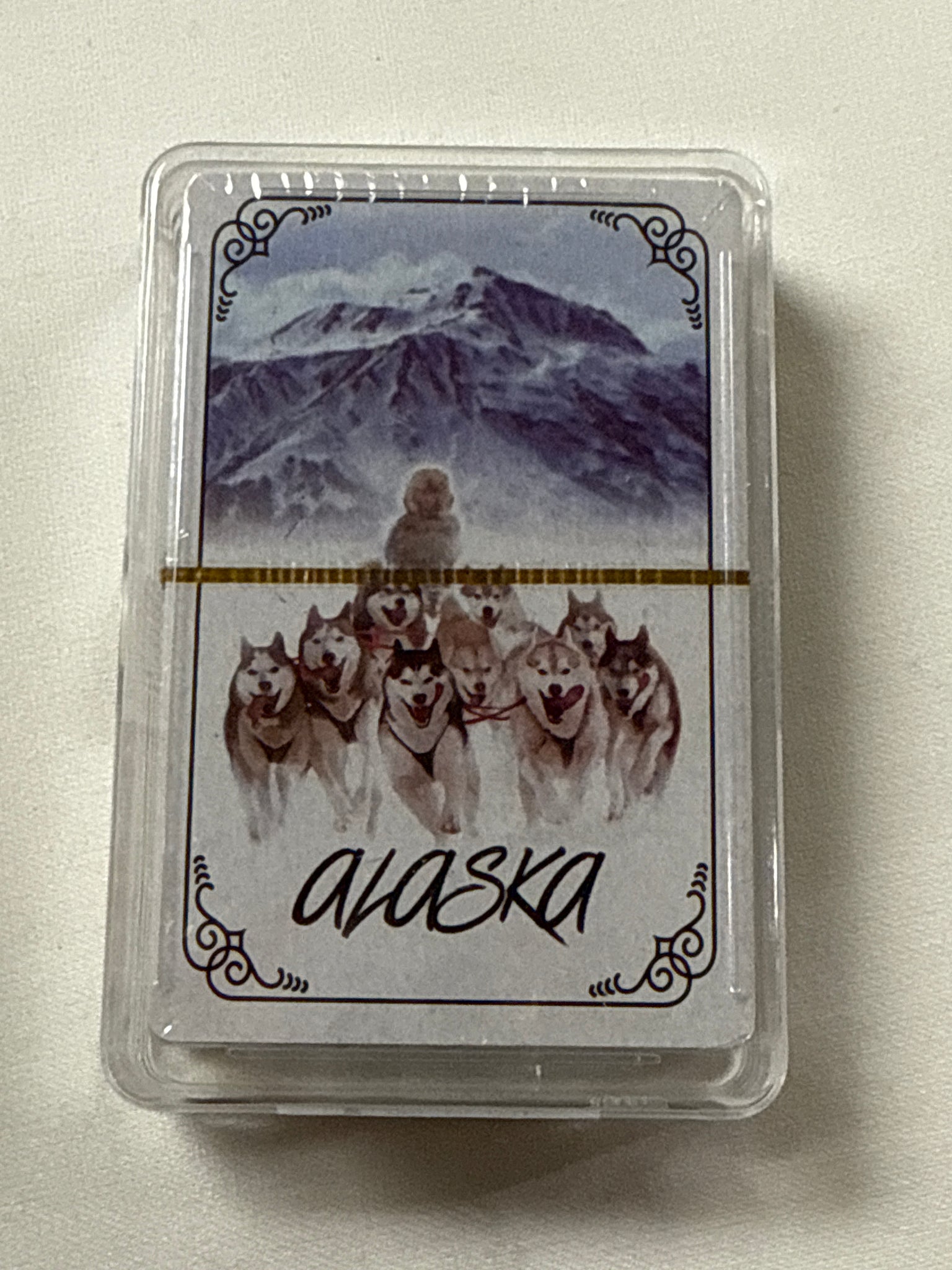 Playing card- dig sled