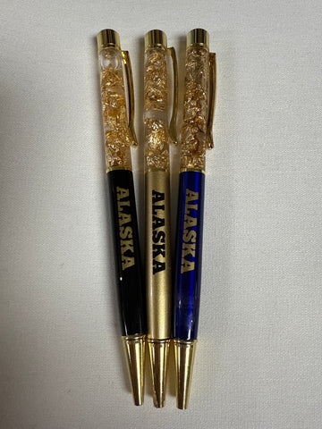 Pen with gold flakes