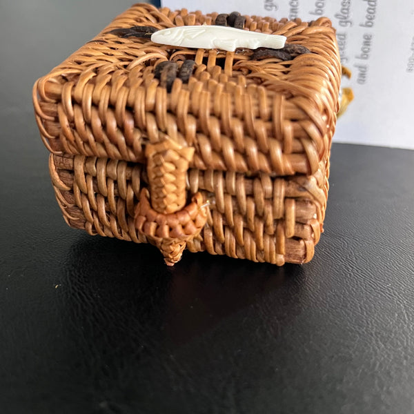 SQUARE HAND-WOVEN GRASS BASKET WITH CARVED BONE