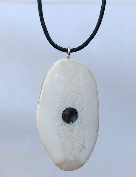 FOSSIL WALRUS IVORY PENDANT WITH LEATHER CORD